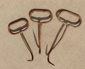 lot 109 image: (3) Vintage Hay Hooks