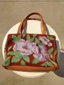 lot 147 image: Vintage Tommy Bahama Purse - Apparently Unused