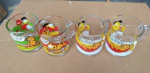 lot 196 image: (4) Vintage McDonalds Garfield Mugs