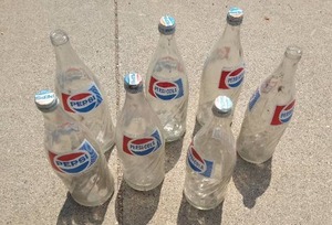 lot 203 image: (7) Vintage 1 Qt. Pepsi Bottles