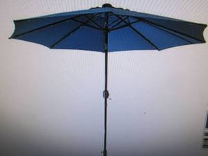 lot 65 image: Sun-Ray 9 Solar-Lighted Market Umbrella