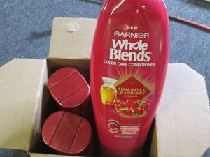 lot 107 image: case of 4  22floz color care conditioner
