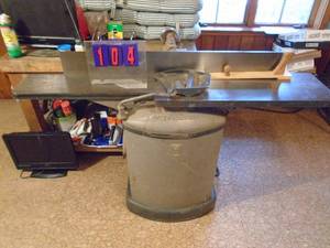 lot 104 image: Yates American model J131 8 jointer. Very heavy unit. Nice used condition. 220 c 3 ph. Large service door walkout basement. As shown.