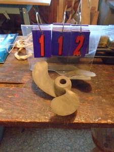lot 112 image: Brass propeller. Approx 10. As shown.