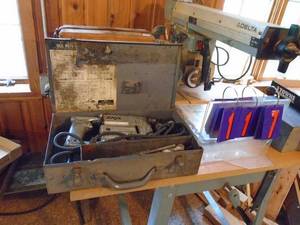 lot 117 image: Skil 12 hammer drill in metal box. As shown.