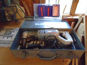lot 118 image: Skil 90 degree drill in steel box with 12 chuck. As shown.