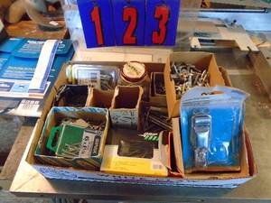 lot 123 image: Qty of 2 flats of misc screws & hardware. As shown.