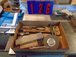 lot 126 image: Vintage folding rulers100 tape & body hammer. As shown.