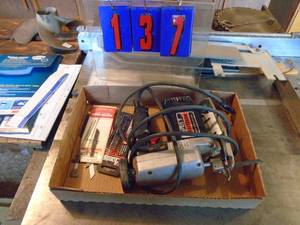 lot 137 image: Craftsman scroll saw with blades. Good used condition. Tested & works. As shown.