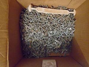 lot 157 image: Qtyof 5 boxes of nails. As shown.