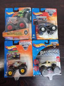 lot 12 image: Four Packs Of Monster Jam Hot Wheels