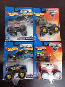 lot 14 image: Four Packs Of Monster Jam Hot Wheels