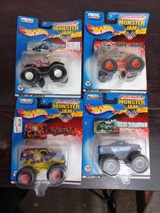 lot 15 image: Four Packs Of Monster Jam Hot Wheels