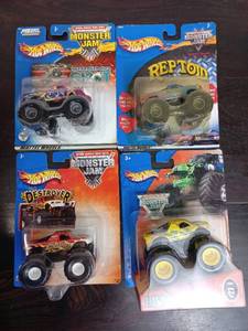 lot 16 image: Four Packs Of Monster Jam Hot Wheels