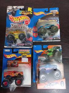 lot 18 image: Four Packs Of Monster Jam Hot Wheels