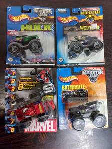 lot 19 image: Four Packs Of Monster Jam Hot Wheels and More