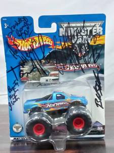 lot 24 image: Signed Monster Jam Hot Wheels Truck