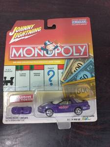 lot 44 image: Monopoly Car and Game Token