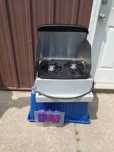 Suburban 2 burner gas stove. Looks litte use. As shown.
