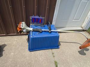 Skil 2 cycle weed trimmer. Used condition. As shown.
