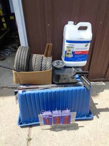Misc tires, kerosene & etc. As shown.