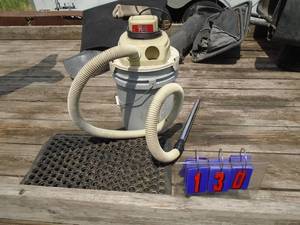 Shop vac & floor mats. As shown.