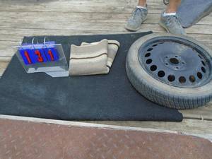 Spare tires & floor mats. As shown.