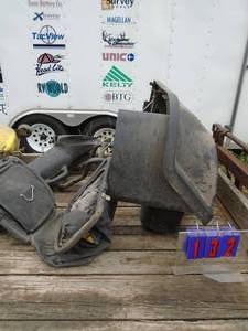 John Deere 2 bag grass catcher. As shown.