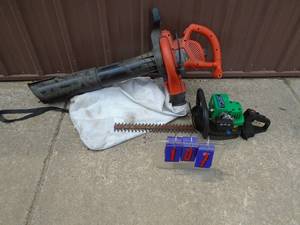 Green Works 2 cycle hedge trimmer & 110 volt blower. As shown.