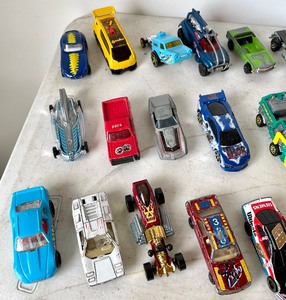 lot 105 image: Cars by Hot Wheels, Maisto, Matchbox and More