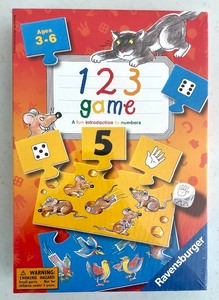 lot 117 image: New Sealed Ravensburger Games and a Puzzler Deck