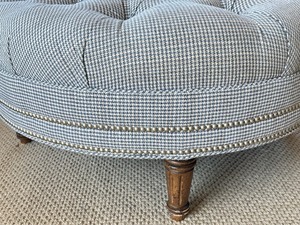 lot 10 image: Upholstered Tufted Circular Ottoman
