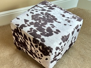 lot 50 image: Upholstered Cow Print Ottoman