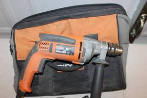 lot 33 image: RIDGID 8 Amp Corded 12 in. Heavy-Duty Variable Speed Reversible Drill R7111