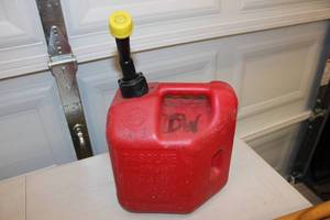 lot 50 image: Hoe, Brace Bar, and Gas Can Combo