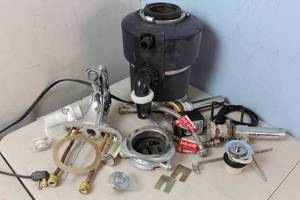 lot 71 image: Garbage Disposal w Plumbing Hardware