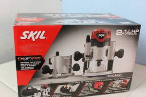 lot 74 image: NEW - SKIL Combo Router Kit 2-14 hp