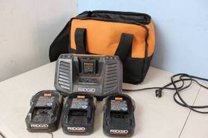 lot 82 image: RIGID 3ct High Capacity 2.0 Ah Lithium Ion 18v Rechargable Batteries w Charger and Bag