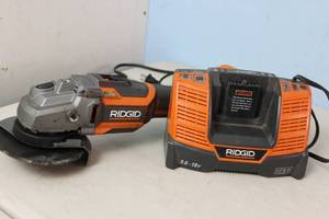 lot 92 image: RIGID Cordless Brushless 4-12 in. Angle Grinder  R86042VN  No Battery w Charger