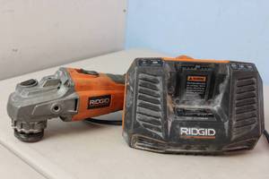 lot 93 image: RIGID Cordless Brushless 4-12 in. Angle Grinder  R86041  No Battery w Charger
