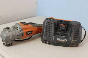 lot 94 image: RIGID Cordless Brushless 4-12 in. Angle Grinder  R86041  No Battery w Charger