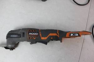 lot 95 image: RIGID Cordless Brushless 18V JobMax Multi-Tool R8223406 No Battery w Charger