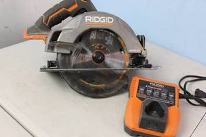 lot 96 image: RIGID Cordless Brushless 18V 7-14 in. Circular Saw R8653 No Battery w Charger