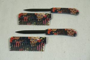 lot 46 image: 2 Hair Comb Knives