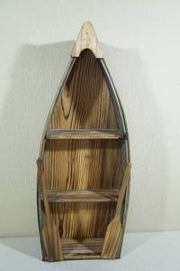 lot 102 image: Row Boat Shelf