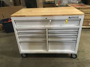 lot 1 image: Husky 46 in. W x 51 in. D Standard Duty 9-Drawer Mobile Workbench with Solid Top Full Length Extension Table in Gloss White Customer Returns See Pictures
