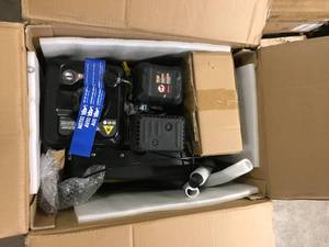 lot 27 image: Champion Power Equipment 22 in. 212cc 4-Stroke Gas Garden Front Tine Tiller with Forward and Reverse Customer Returns See Pictures