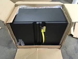 lot 33 image: Husky Pro Duty Welded 20-Gauge Steel Wall Mounted Garage Cabinet in Black LINE-X (28 in. W x 22 in. H x 14 in. D)   Customer Returns See Pictures
