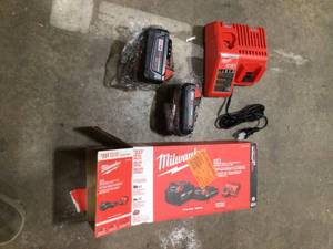 Milwaukee M18 18-Volt Lithium-Ion Starter Kit with One 5.0 Ah and One 2.0 Ah Battery and Charger  Customer Returns See Pictures