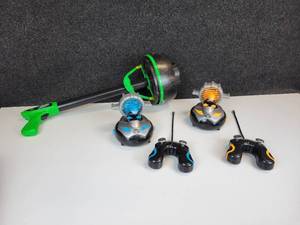 lot 431 image: Pair of Kid Galaxy RC Racers and FireTek Zyclone Light Up Zing Ring Slinger